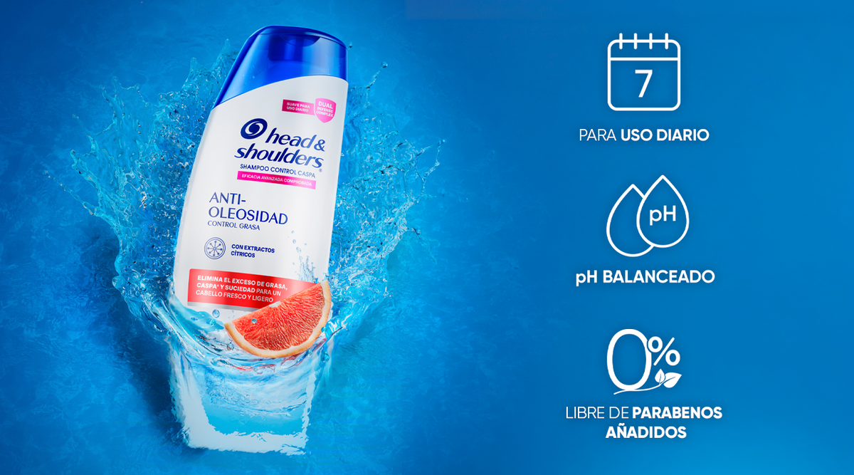 Botella de Head & Shoulders Shampoo Anti-Oleosidad en una salpicadura de agua con rodaja de toronja, con íconos "Para uso diario", "pH balanceado" y "0% libre de parabenos añadidos"