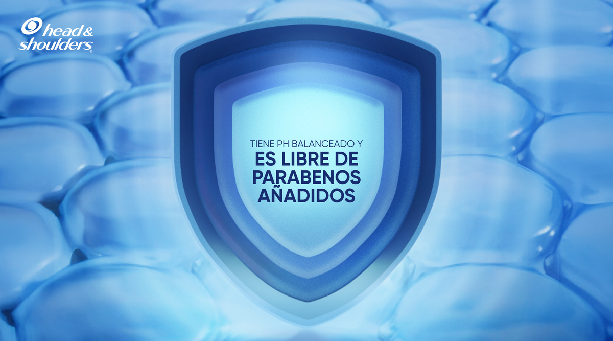 Escudo protector Head & Shoulders sobre fondo azul con burbujas, con texto "Es libre de parabenos añadidos"