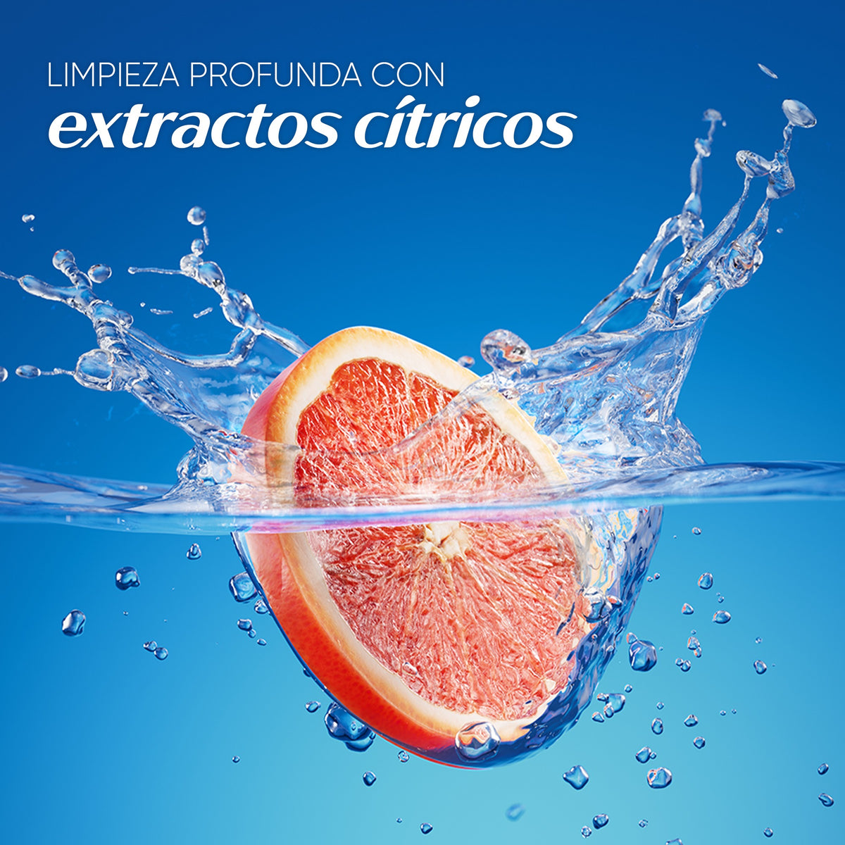 Rodaja de toronja cayendo en agua, con texto "Limpieza profunda con extractos cítricos"